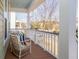 Relaxing front porch with comfortable chairs and scenic neighborhood views, perfect for enjoying outdoor living and fresh air at 158 Sandshell Dr, Charleston, SC 29492