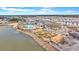 Aerial view of the community amenity center with a pool, playground, and lakefront access at 170 Callibluff Dr, Summerville, SC 29486