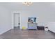 Bonus room featuring hardwood floors, a gray dresser and a modern lighting fixture at 170 Callibluff Dr, Summerville, SC 29486