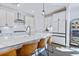 Bright kitchen featuring white cabinets, a large center island, and stainless steel appliances at 170 Callibluff Dr, Summerville, SC 29486