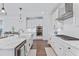 Bright kitchen featuring white cabinetry, quartz countertops, and stainless steel appliances at 170 Callibluff Dr, Summerville, SC 29486