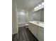 Full bathroom showcasing modern vanity, tub-shower combo, and sleek flooring at 1703 Scarlett Maple St, Summerville, SC 29486