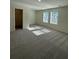 Sunlit bedroom with a view of a closet and two large windows at 1703 Scarlett Maple St, Summerville, SC 29486