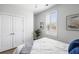 Bedroom boasting a ceiling fan, plantation shutters, closet and natural light at 2021 Arbutus Ave, North Charleston, SC 29405