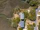 Aerial perspective of property nestled near a creek, showcasing its unique waterfront setting at 204 William St, Mount Pleasant, SC 29464