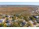 Community aerial view featuring waterfront homes with private docks and expansive marsh landscape at 204 William St, Mount Pleasant, SC 29464