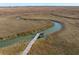 Picturesque aerial view of the private dock and winding creek through the marsh at 204 William St, Mount Pleasant, SC 29464