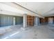 Unfinished basement with concrete floor, block support pillars, and exposed ceiling at 204 William St, Mount Pleasant, SC 29464
