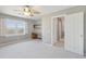 Bedroom featuring built-in shelving, soft carpet, and beautiful marsh views from the window at 204 William St, Mount Pleasant, SC 29464