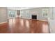 Bright, open living room featuring a fireplace, hardwood floors, and natural light at 204 William St, Mount Pleasant, SC 29464