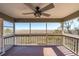 Screened porch with ceiling fan overlooking the marsh at 204 William St, Mount Pleasant, SC 29464