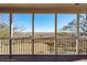 Covered porch with scenic marsh views at 204 William St, Mount Pleasant, SC 29464