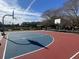 Exterior shot of a community basketball court set against a bright blue sky at 21 Hester St # 2, Charleston, SC 29403