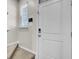 Inviting entryway featuring a white door and neutral walls at 211 Tall Grass Ct, Summerville, SC 29483