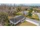 Aerial view showcases the house, marsh views, other houses, and mature trees at 2137 Barbour Dr, Charleston, SC 29414