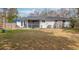 Large backyard featuring a patio with seating and a grill at 2137 Barbour Dr, Charleston, SC 29414