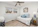 Bright bedroom with a daybed, neutral color palette, and large windows offering natural light at 2137 Barbour Dr, Charleston, SC 29414