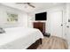 Bright bedroom with wood floors, a ceiling fan, and traditional furniture at 2137 Barbour Dr, Charleston, SC 29414