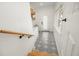 Well-lit laundry area with black and white patterned floors, storage baskets, and ample natural light at 2137 Barbour Dr, Charleston, SC 29414