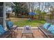 Cozy outdoor seating area with decorative pillows and a metal table at 2137 Barbour Dr, Charleston, SC 29414