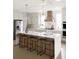 Open kitchen featuring a spacious island with seating and stainless steel refrigerator at 2151 Arthur Rose Ln, Johns Island, SC 29455