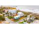 Coastal community featuring stunning beach access, and colorful buildings at 220 W Arctic Ave, Folly Beach, SC 29439