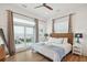 Bright bedroom with balcony access, ocean views, and stylish furnishings at 220 W Arctic Ave, Folly Beach, SC 29439