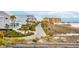 Coastal community street with well-maintained properties and beach access at 220 W Arctic Ave, Folly Beach, SC 29439