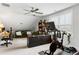 Bright, airy finished attic featuring workout space, seating area, and desk at 2312 Oakland Rd, Charleston, SC 29414