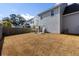 Large backyard with a seating area, privacy fence, and ample space at 2312 Oakland Rd, Charleston, SC 29414