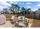 Backyard patio featuring a comfortable seating area and gas grill at 2312 Oakland Rd, Charleston, SC 29414