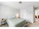 Calm bedroom featuring neutral colors, a ceiling light, and a view to another room at 2312 Oakland Rd, Charleston, SC 29414