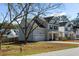Charming two-story home with a two-car garage and well-maintained landscaping at 2312 Oakland Rd, Charleston, SC 29414