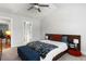 Comfortable primary bedroom with high ceilings, a plush bed, and stylish decor at 2312 Oakland Rd, Charleston, SC 29414