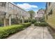 Picturesque yard, accented by verdant landscaping, invites peaceful outdoor enjoyment at 244 Ashley Ave, Charleston, SC 29403