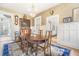 Charming dining room with a large table, built-in cabinet, and direct access to the front entry at 244 Ashley Ave, Charleston, SC 29403