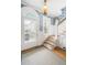 Entryway boasts hardwood floors, decorative wallpaper, and a staircase at 244 Ashley Ave, Charleston, SC 29403
