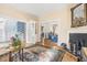 Bright living room featuring hardwood floors, fireplace, and elegant decor throughout the home at 244 Ashley Ave, Charleston, SC 29403