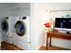 Laundry room featuring front load washer and dryer and workspace at 2590 Otranto Rd, North Charleston, SC 29406