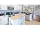 Well-equipped kitchen with stainless steel appliances, center island, and ample counter space for meal preparation at 267 Cameron St, Summerville, SC 29486