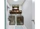 Modern laundry room with stainless steel appliances, upper cabinets, and bright lighting at 267 Cameron St, Summerville, SC 29486