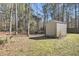 A large backyard area with a shed and several mature trees at 2969 Bobo Rd, Mount Pleasant, SC 29466