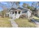 Charming single-story home with a cozy front porch and well-maintained landscaping at 2969 Bobo Rd, Mount Pleasant, SC 29466