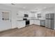 Updated kitchen featuring stainless steel appliances, granite counters, and white cabinetry at 2969 Bobo Rd, Mount Pleasant, SC 29466