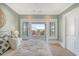 Serene main bedroom with private balcony access and soothing neutral tones throughout at 3030 Marshall Blvd, Sullivans Island, SC 29482