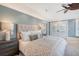 Bright primary bedroom boasts vaulted ceilings, plush carpeting, and french doors for outdoor access at 3030 Marshall Blvd, Sullivans Island, SC 29482