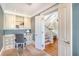 Home office showcases custom built-in cabinetry, a desk, and an inviting view of the staircase at 3030 Marshall Blvd, Sullivans Island, SC 29482