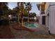 Inviting pool area surrounded by lush landscaping and a serene backyard setting, perfect for relaxation and enjoyment at 3030 Marshall Blvd, Sullivans Island, SC 29482