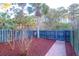 Private backyard with a wooden fence and brick walkway at 3049 Park West Blvd, Mount Pleasant, SC 29466