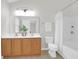 Bright bathroom featuring a double sink vanity, toilet, and shower-tub combo at 3049 Park West Blvd, Mount Pleasant, SC 29466